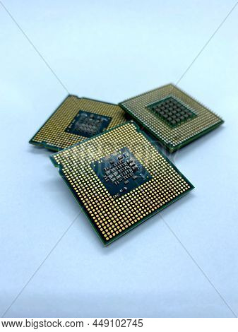 Three Micro Processors Stack Close-up View Isolated On White