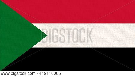 Flag Of Sudan. Sudanian Flag On Fabric Surface. Fabric Texture. National Symbol. Republic Of The Sud