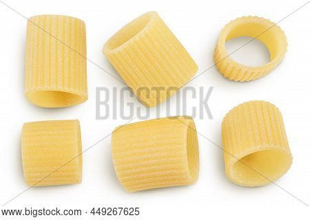 Raw Italian Pasta Isolated On White Background With Clipping Path . Mezze Maniche Rigate Bronze Die.