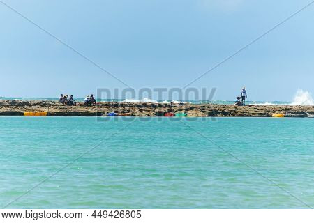 Ipojuca, Pe, Brazil - October 15, 2021: People On The Reef Between The Calm Waters Of Muro Alto Beac