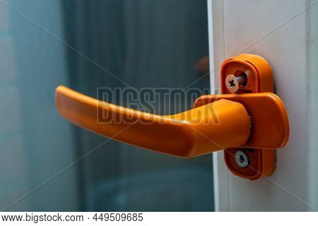 Installation Of The Handle On The Double-glazed Window. High Quality Photo