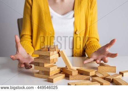 Wooden Block And Tower Collapses, Management Of Risks And Economic Instability Concept.