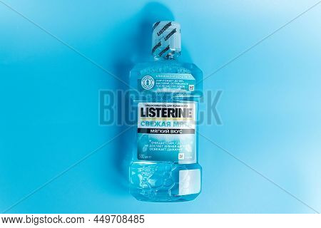 Tyumen, Russia-february 06, 2022: Listerine On Blue Background. Listerine Is A Brand Of Antiseptic M