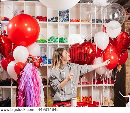 Woman With Composition Of White, Red, Foil Balloons In Form Of Heart And Ball.