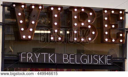 Warsaw, Poland. 24 February 2022. Sign Vibe Frytki Belgijskie. Company Signboard  Vibe Frytki Belgij
