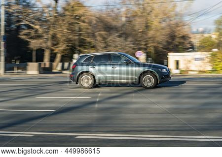 Audi Q5 Car In Motion. High Speed Suv Car Driving In The City. Moscow, Russia - October 2021
