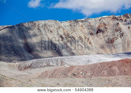 Ice glacier in colored mountains. Tien Shan