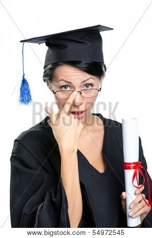 Graduating student in glasses with the diploma adjusts the spectacles, isolated on white
