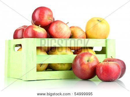 Juicy apples in wooden box isolated on white