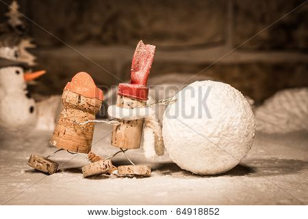 Wine Cork Figures, Concept Rolling Snowball Together