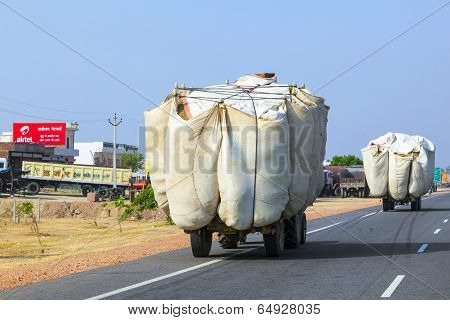 Straw Transport With Tractor On Country Road