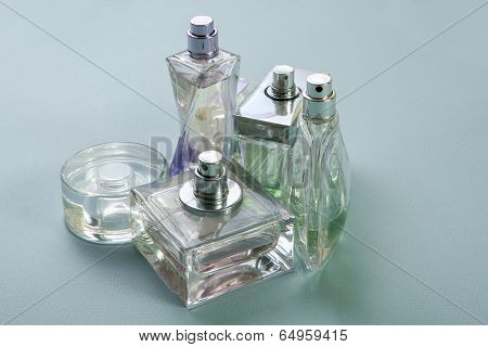 Multicolored Perfumes In Bottles Of Different Shapes