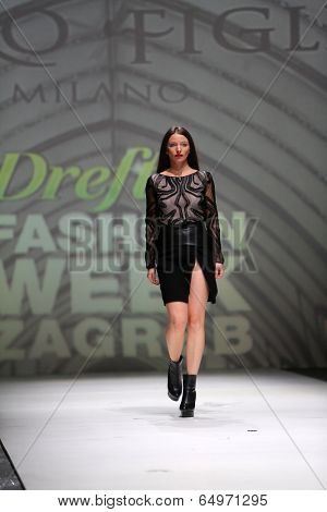 ZAGREB, CROATIA - MAY 09: Fashion model wearing clothes designed by Avaro Figlio on the Zagreb Fashion Week on May 09, 2014 in Zagreb, Croatia.
