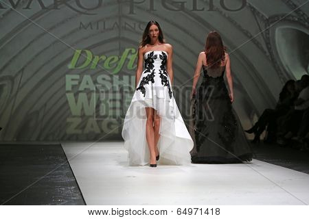 ZAGREB, CROATIA - MAY 09: Fashion model wearing clothes designed by Avaro Figlio on the Zagreb Fashion Week on May 09, 2014 in Zagreb, Croatia.