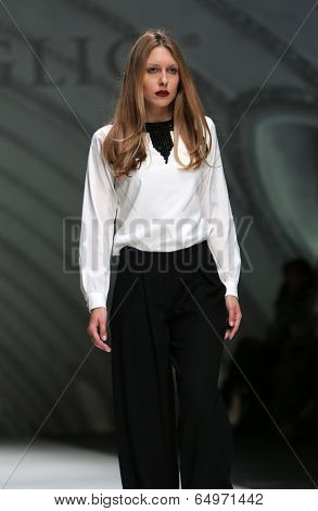 ZAGREB, CROATIA - MAY 09: Fashion model wearing clothes designed by Avaro Figlio on the Zagreb Fashion Week on May 09, 2014 in Zagreb, Croatia.