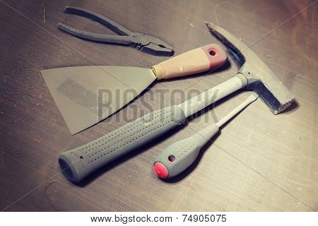 Set Of Tools Under Dust