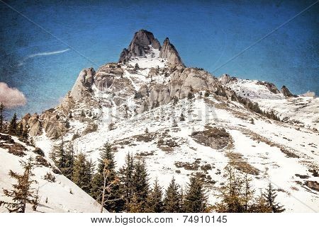 Snowy peaks of a mountain in winter