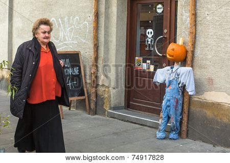 KRAKOW, POLAND - OCT 29, 2014: Unidentified townspeople and scenery for celebrating Halloween in Krakow.