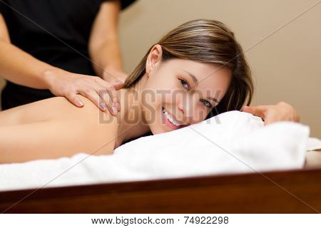 Woman having a massage in a spa