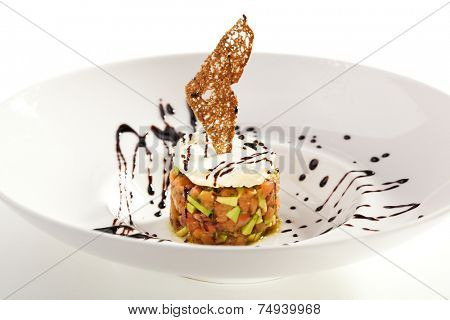 Salmon with Avocado Tartare. Topped with Cream Cheese and Crispy Bread