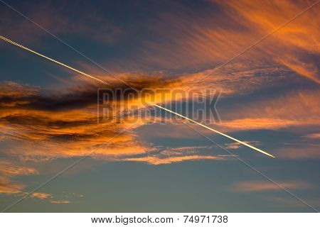 Cloudy Evening Sky With Airplanes