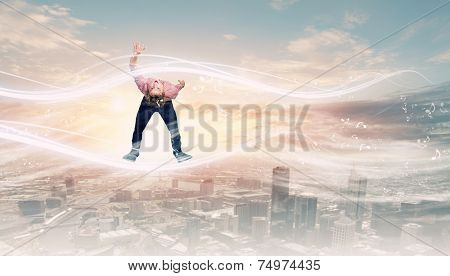 Young guy in casual evading from light rays