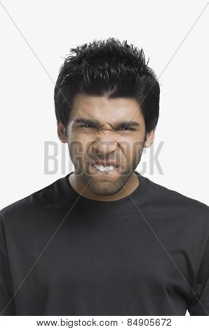 Close-up of a man looking angry