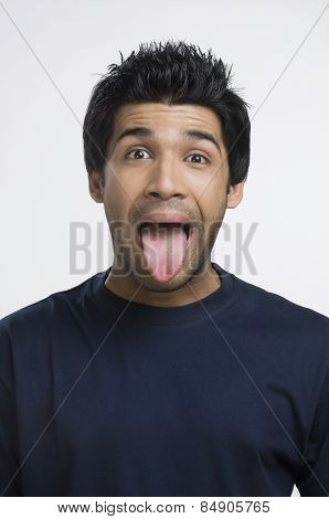 Man sticking his tongue out