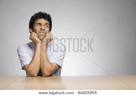 Man making a funny face and looking sideways