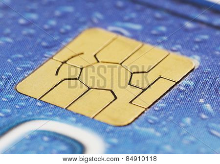 Close-up of a computer chip on a credit card