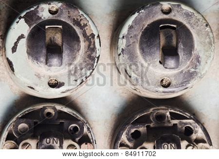 Close-up of old lightswitches