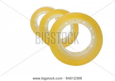 Close-up of four rolls of adhesive tapes