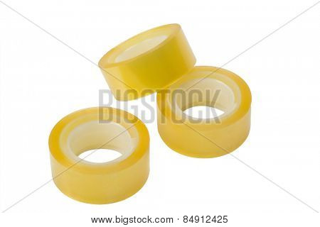 Close-up of three rolls of adhesive tapes