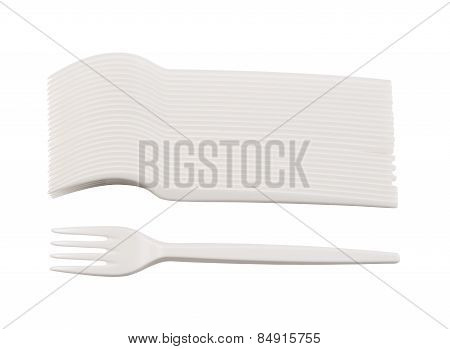 Disposable white plastic forks isolated