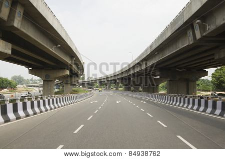 Road in the middle of overpasses, National Highway 8, New Delhi, India
