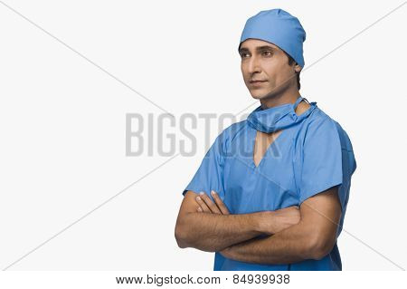 Doctor standing with arms crossed