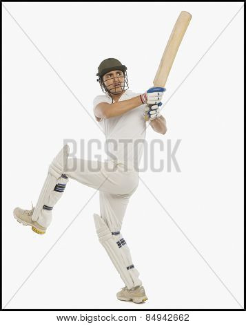 Cricket batsman playing a hook shot