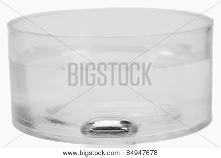 Close-up of a mercury sunk in a bowl of water