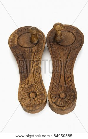 Close-up of pair of Paduka, traditional Indian wooden footwear worn by Hindu priests and Brahmins