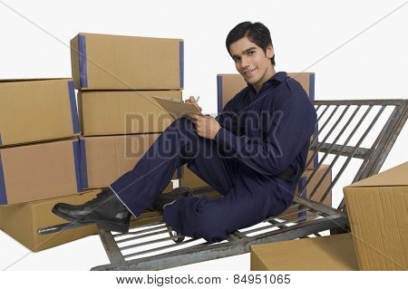 Store manager checking inventory