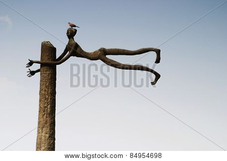 Bird perching on a sculpture, Garden of Five Senses, Saidul Ajaib, New Delhi, India