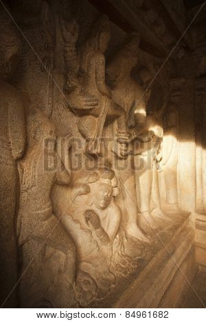 Carving details of Varaha saving the Goddess Earth from the flood at Varaha Cave Temple, Mahabalipuram,India