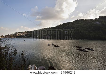 People rowing boats in a lake, Nainital, Uttarakhand, India, Asia