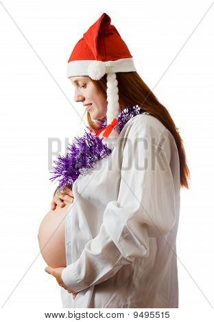 Mulher grávida em traje de Natal