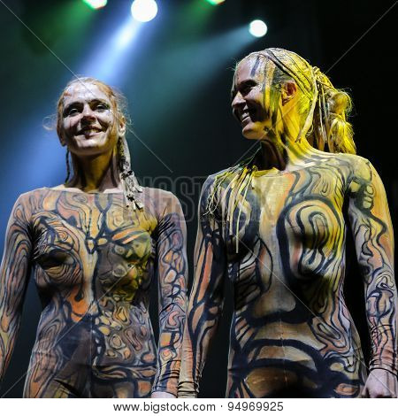KRAKOW POLAND - JUNE 20 2014: The night of the Music on Szczepanski Square in Cracow. Slavic Prelude perfomed by WATAHA Slavic Drummers and Art Color Ballet shows to the modern viewer colorfull archetype of the Slavic world full of magic