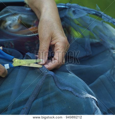 Scissors In Female Hands