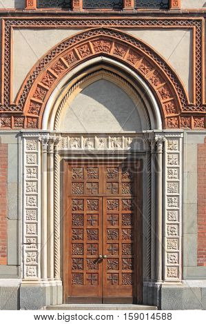 Entrance door of the romanic style church of Santa Maria in Strada. Monza, Italy