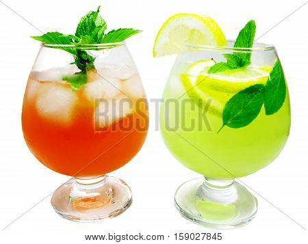 fruit cruchon cocktail punch in glasses with ice and fruit