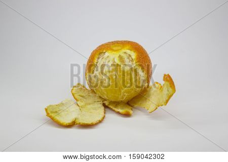 ripe tangerine peeled, on a white background