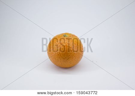 ripe juicy tangerine on a white background